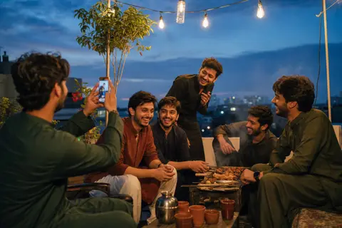 Friends at a rooftop gathering